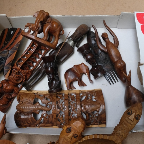 932 - African carved wood figures, animals etc