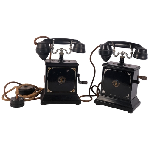 1178 - 2 early 20th century black telephones with original wiring, H30cm