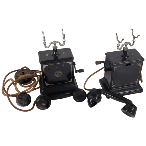 1178 - 2 early 20th century black telephones with original wiring, H30cm