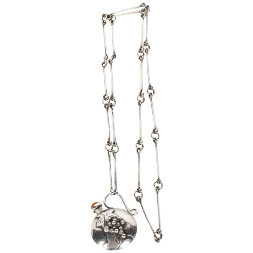 1463 - A silver and amber set flask design pendant and chain, pendant width 35mm