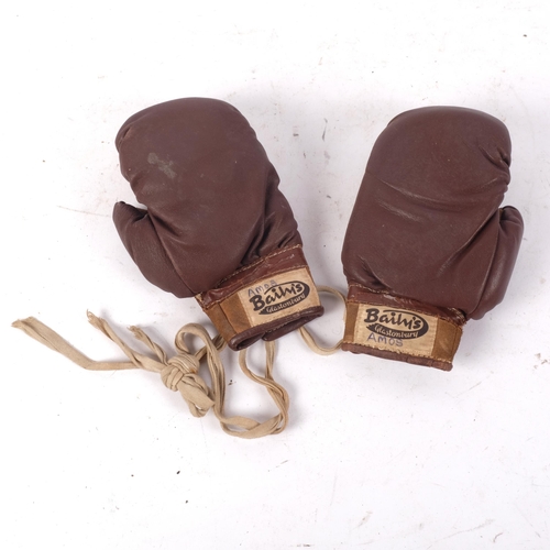 1144 - A pair of Baily's of Glastonbury child's leather boxing gloves