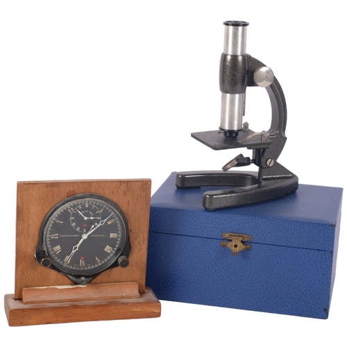 1148 - Vintage Smiths car clock on wooden stand, and a small cased microscope