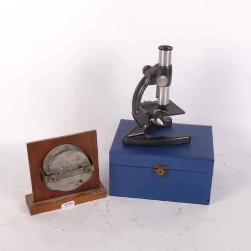 1148 - Vintage Smiths car clock on wooden stand, and a small cased microscope