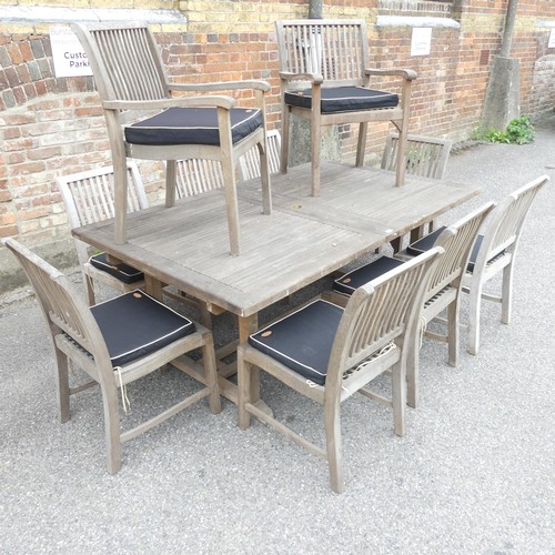 2690 - CHIC TEAK - a weathered teak garden dining set comprising an extending dining table, 200x76x120cm (e... 