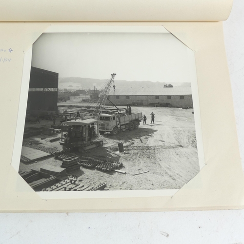 574 - A collection of early 20th century black and white photographs, including military, swimming present... 