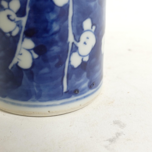 628 - A Chinese blue and white sleeve vase with prunus decoration, H20cm, with 4 character mark to the bas... 