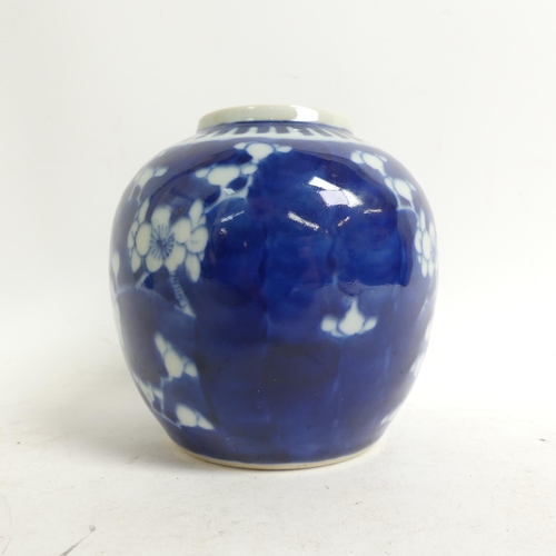 628 - A Chinese blue and white sleeve vase with prunus decoration, H20cm, with 4 character mark to the bas... 