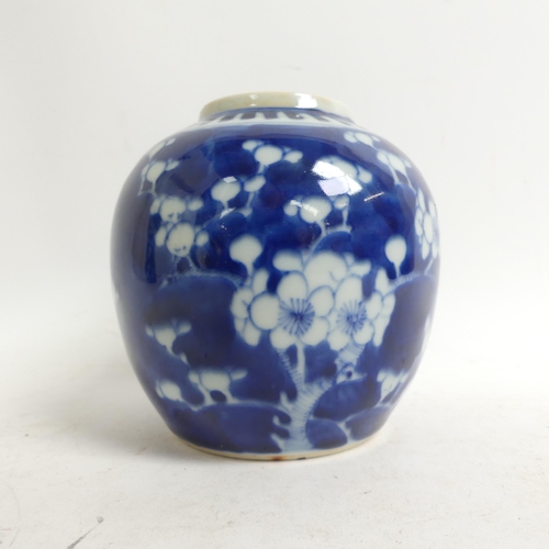 628 - A Chinese blue and white sleeve vase with prunus decoration, H20cm, with 4 character mark to the bas... 