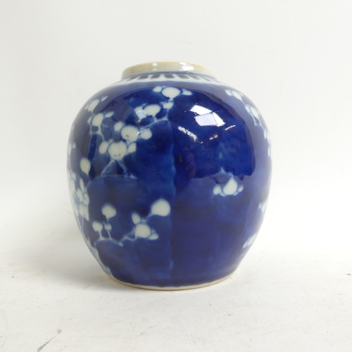 628 - A Chinese blue and white sleeve vase with prunus decoration, H20cm, with 4 character mark to the bas... 