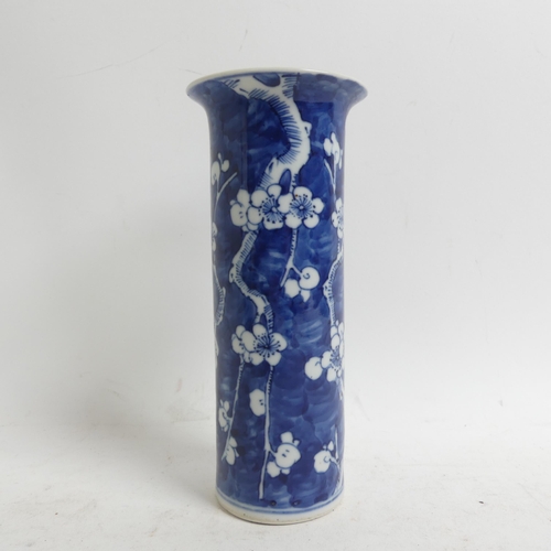 628 - A Chinese blue and white sleeve vase with prunus decoration, H20cm, with 4 character mark to the bas... 