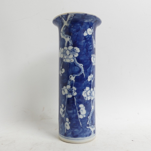 628 - A Chinese blue and white sleeve vase with prunus decoration, H20cm, with 4 character mark to the bas... 