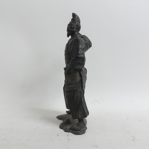 631 - A Chinese bronze temple figure, study of Guyan and moving child, a small bronze 2-handled vase, a br... 