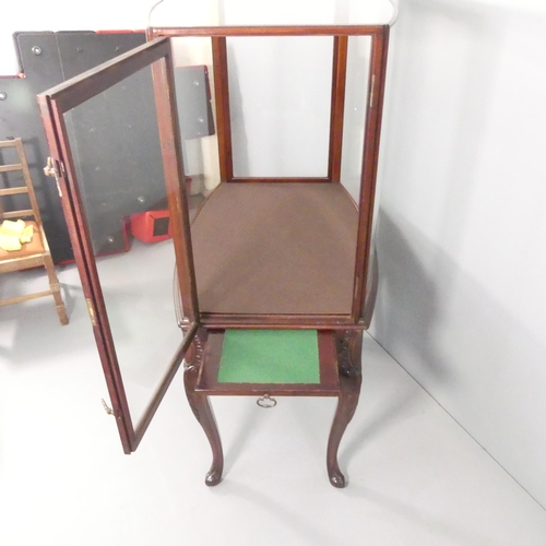 389 - A Victorian mahogany two-section centre-standing museum display cabinet on stand, with side opening ... 