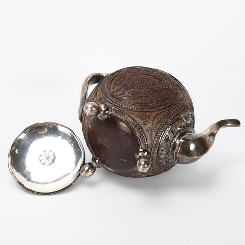 101 - 19th century Indian coconut shell teapot, relief carved peacock and elephant design panels, unmarked... 