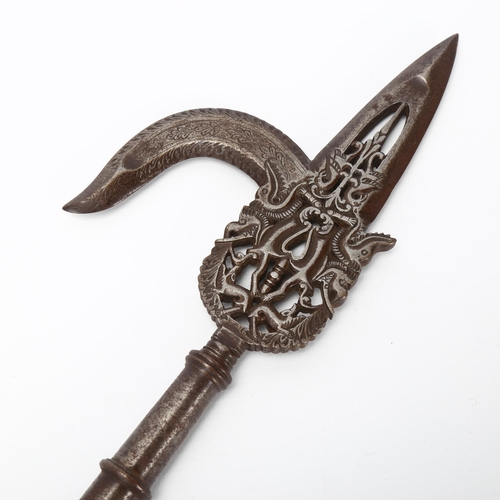 109 - 19th century Indian steel ankus or elephant goad, pierced and engraved blade with bronze finial in t... 