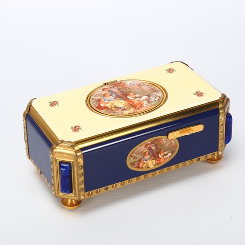 110 - A bird automaton musical box, by Reuge Music Switzerland, blue and cream enamel case with rural scen... 