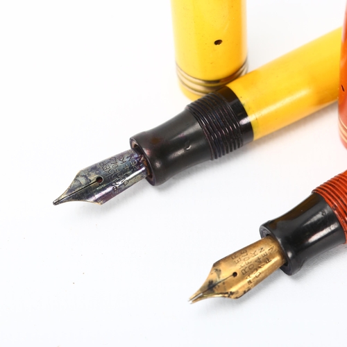 119 - 2 Parker Lady Duofold Lucky Curve fountain pens, Mandarin yellow and orange, circa 1920s with 14ct g... 