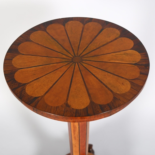 138 - A Regency circular wine table, inlaid rosewood and satinwood with hexagonal centre column and carved... 