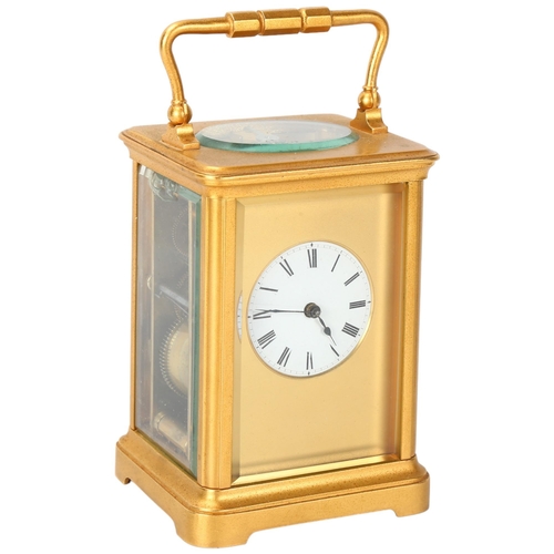 143 - French gilt-brass carriage clock, enamel circular dial in gilded surround, 8-day movement striking o... 