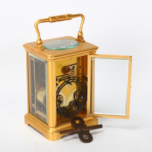 143 - French gilt-brass carriage clock, enamel circular dial in gilded surround, 8-day movement striking o... 