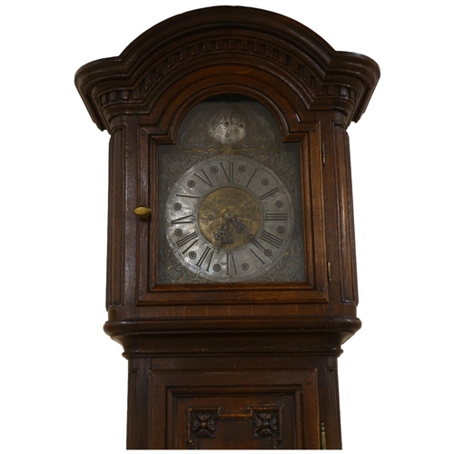 144 - A Swiss 18th century tall oak 30-hour longcase clock, brass and silvered dial dated 1781 with indist... 