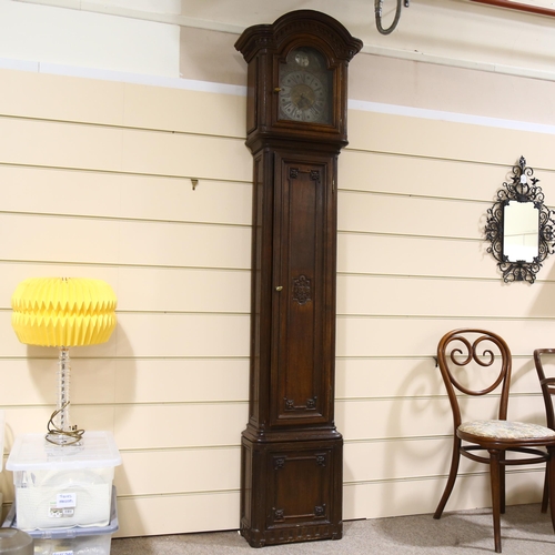 144 - A Swiss 18th century tall oak 30-hour longcase clock, brass and silvered dial dated 1781 with indist... 