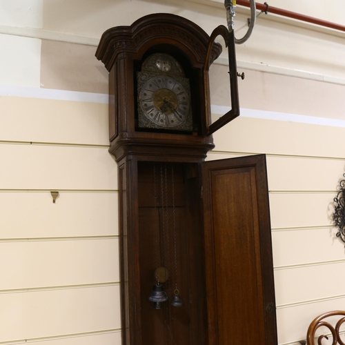 144 - A Swiss 18th century tall oak 30-hour longcase clock, brass and silvered dial dated 1781 with indist... 