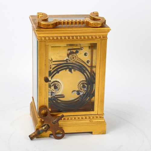 148 - A French gilt-brass cased carriage clock, 8-day movement striking on a gong, retailer's Roberts of L... 