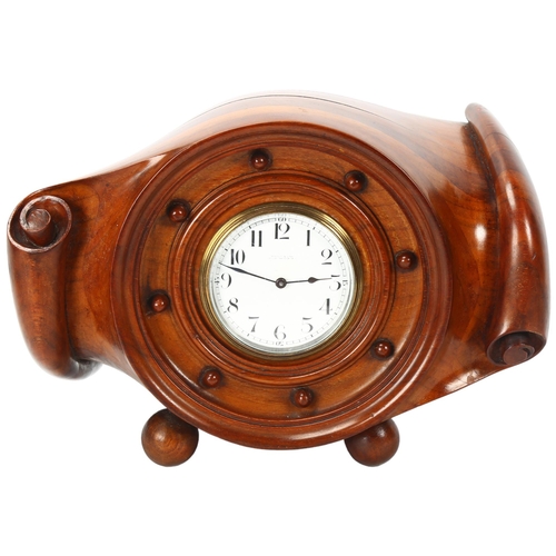 151 - A beautifully carved aircraft propeller hub mantel clock, circa 1910, with enamel dial and 8-day mov... 