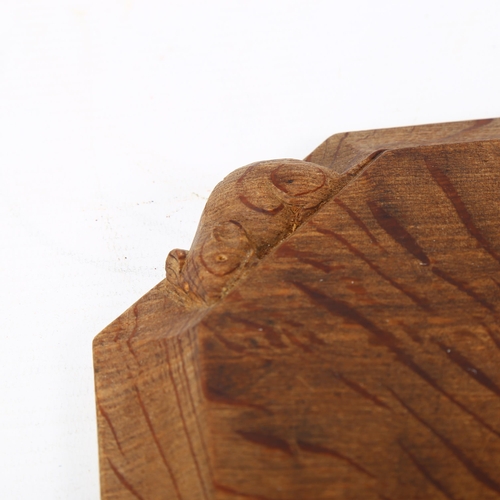 171 - ROBERT MOUSEMAN THOMPSON - octagonal oak cheeseboard with carved mouse edge, 19cm across