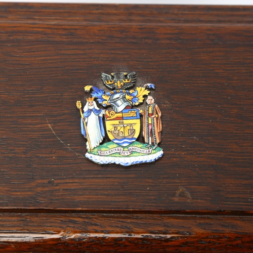 189 - A Freedom scroll for the Borough of Folkestone 1958, in oak casket with enamel crest to the lid, cas... 