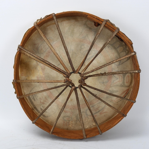 194 - Native American North West coast rawhide hand drum, decorated with mythical figures, early to mid-20... 