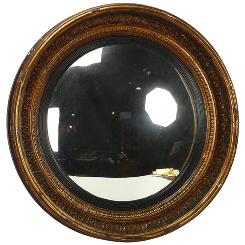 195 - A 19th century gilt-gesso framed convex wall mirror, diameter 65cm