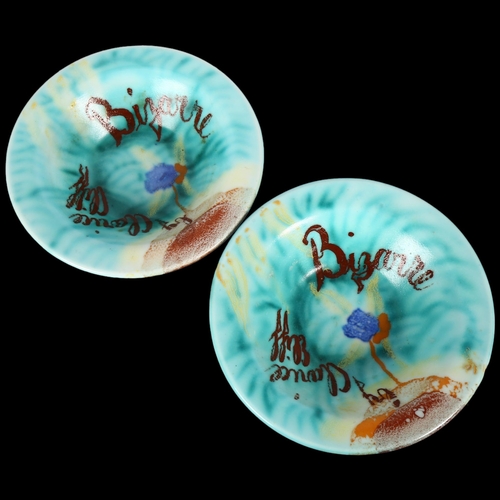 203 - A pair of Clarice Cliff Inspiration Bizarre bowls with hand painted decoration, originally made for ... 