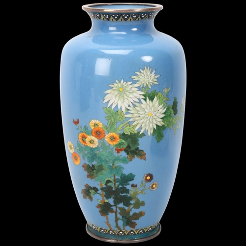 208 - Japanese Meiji Period silver wire cloisonne enamel vase, with fine floral decoration on pale blue gr... 