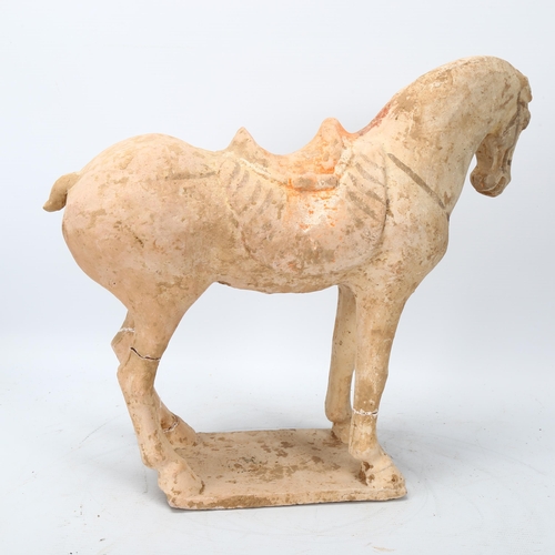 266 - A Chinese Tang style terracotta horse, height 30cm