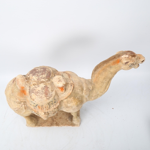 267 - A Chinese Tang style terracotta camel, height 29cm