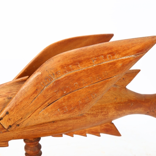 290 - PITCAIRN ISLAND - a carved wood flying fish, length 31cm