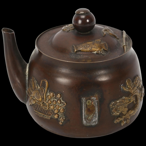 295 - A Japanese Meiji Period miniature teapot design inkwell, with applied gilt-metal mounts, height 5cm