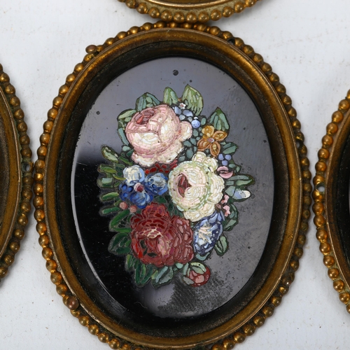 305 - A set of 6 x 19th century floral micro-mosaic plaques, on black glass ground, in oval gilt-metal mou... 