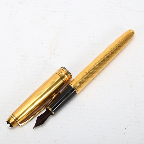 310 - MONT BLANC - a Meisterstuck Solitaire gold plated fountain pen, with certificate