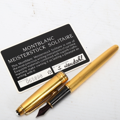 310 - MONT BLANC - a Meisterstuck Solitaire gold plated fountain pen, with certificate