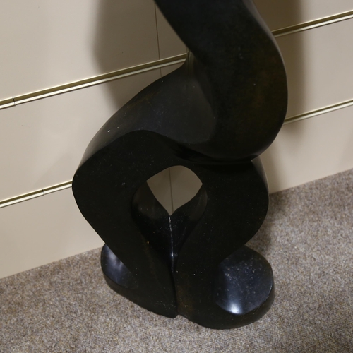 324 - A large African carved spring stone sculpture, The Mermaid by Witness Bonjisi, height 108cm