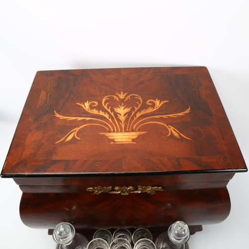 340 - A French walnut liqueur/drinks cabinet, with inlaid marquetry lid, the interior having a lift-out tr... 