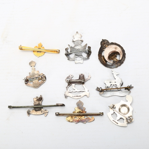 344 - 9 British and Canadian military sweetheart brooches, 5 marked Sterling or Silver