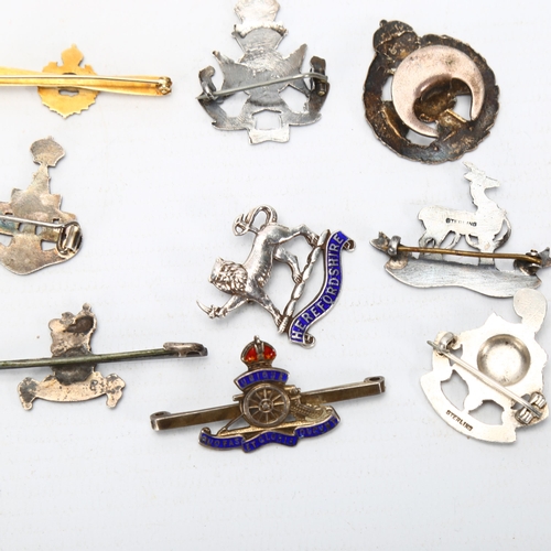 344 - 9 British and Canadian military sweetheart brooches, 5 marked Sterling or Silver