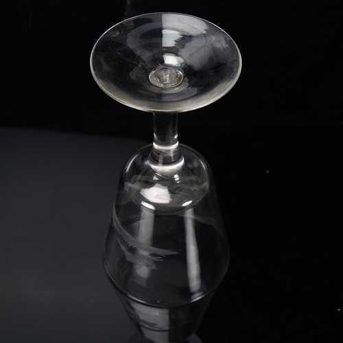 350 - A funnel-shaped glass with engraved hare and hound design, height 20cm