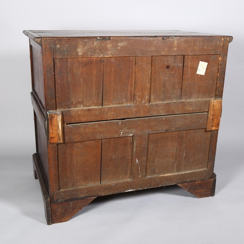 37 - A 17th century oak Jacobian chest of drawers, with field geometric panel drawers and brass pear-drop... 