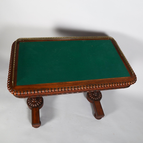 45 - A William IV rosewood writing table, with green baize top and pierced brass gallery, 96 x 57 x 74cm