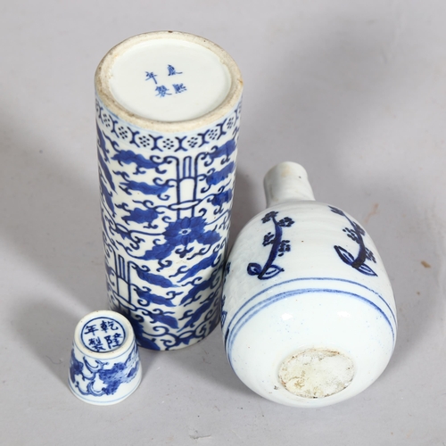 395 - 3 pieces of Oriental blue and white glazed ceramics, Chinese Cylinder vase and beakers with characte... 